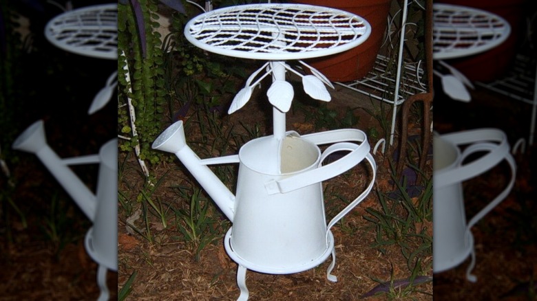 Watering can plant stand