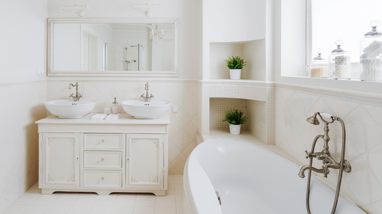 Light bathroom with corner shelves