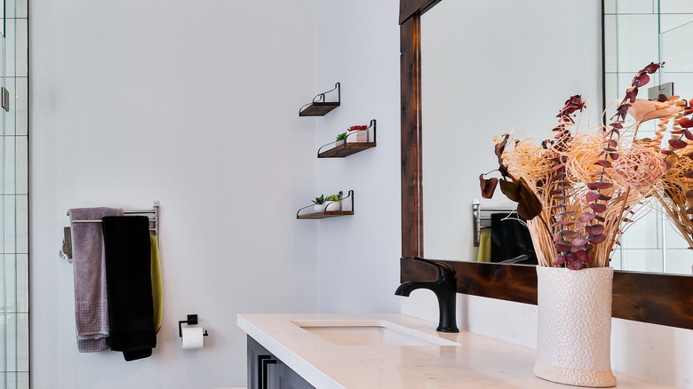 Bathroom with floating shelves