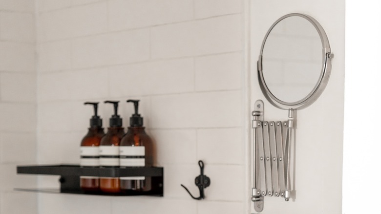 A shower with a shelf