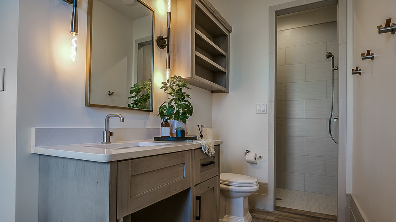 Bathroom with wall mounted cabinet