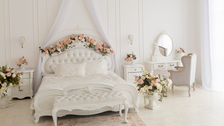 flower garland across a headboard