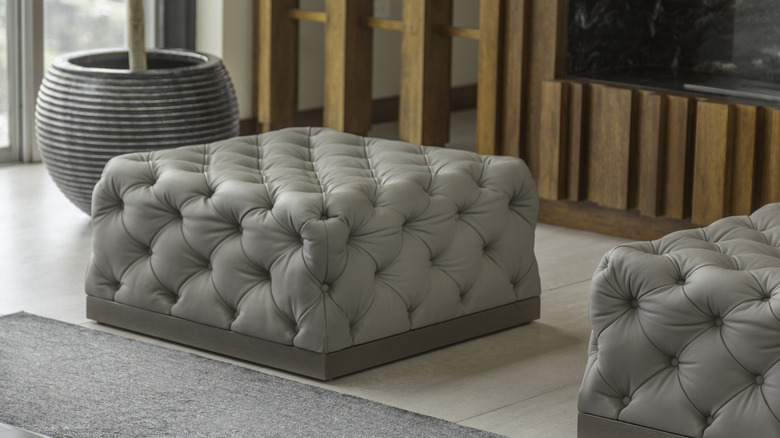 Light gray leather ottoman