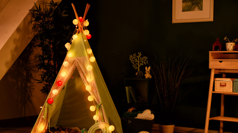 teepee with glowing garland