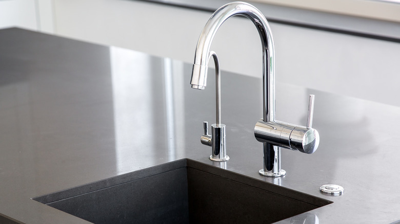 chrome faucet in kitchen island