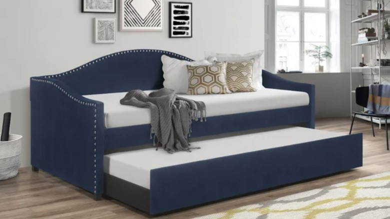 tufted blue daybed with trundle