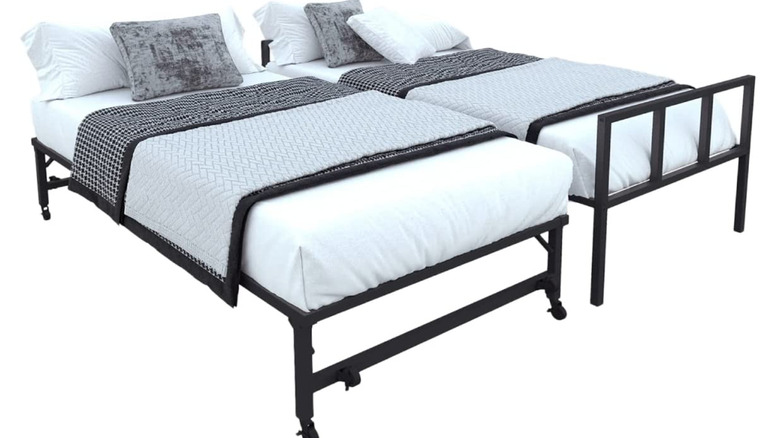 two metal twin bed frames