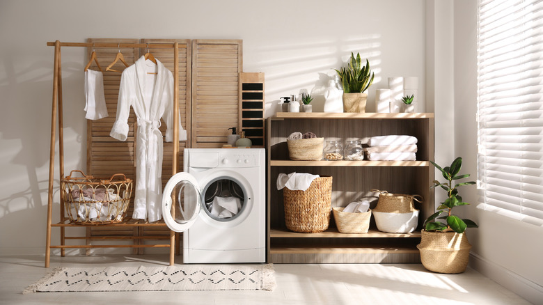 shelving unit next to washer