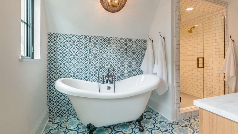 bathroom with patterned tiles