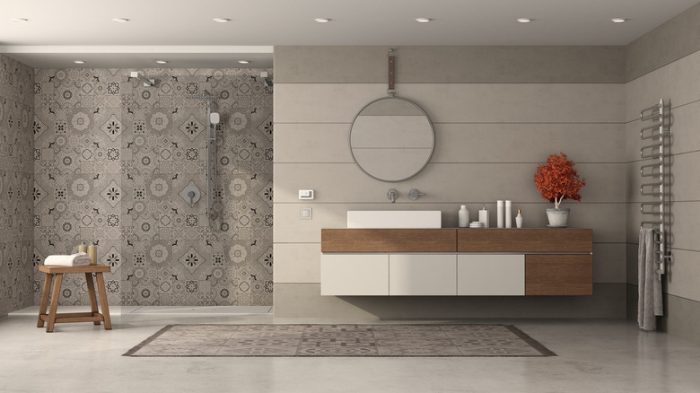bathroom with gray tiles