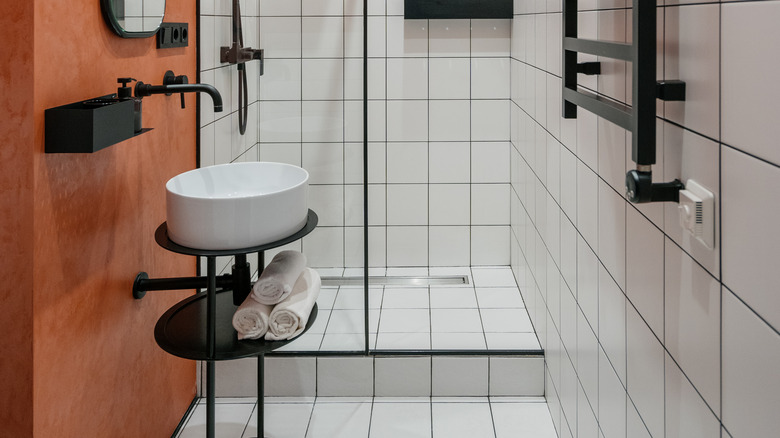 Minimalist bathroom with walk-in shower