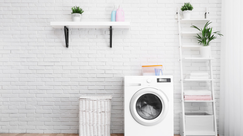 black brackets with white shelf