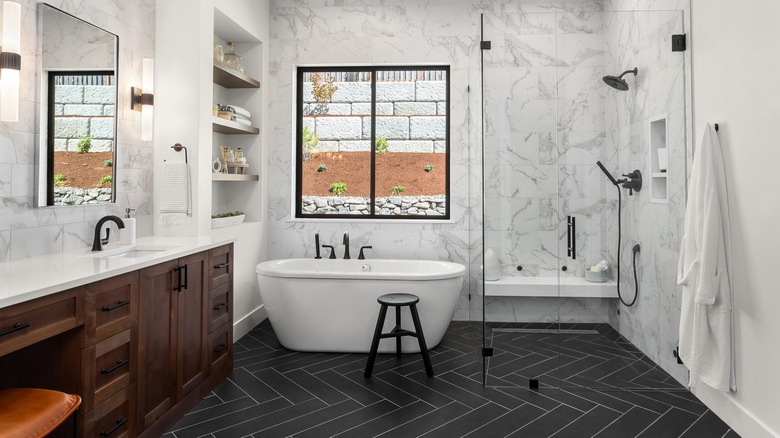 modern space with curved bathtub