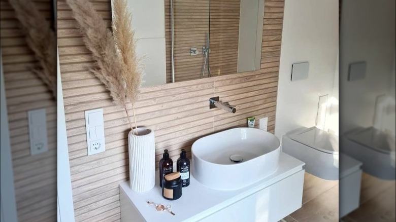 Wood paneling in bathroom