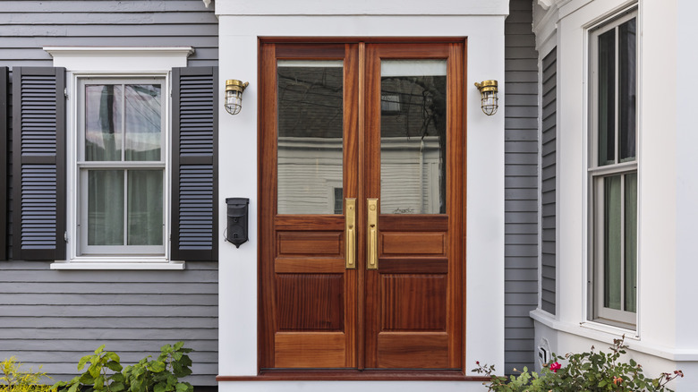 large windows in wooden door