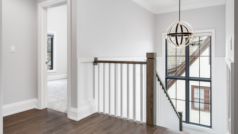 paneled window above entryway