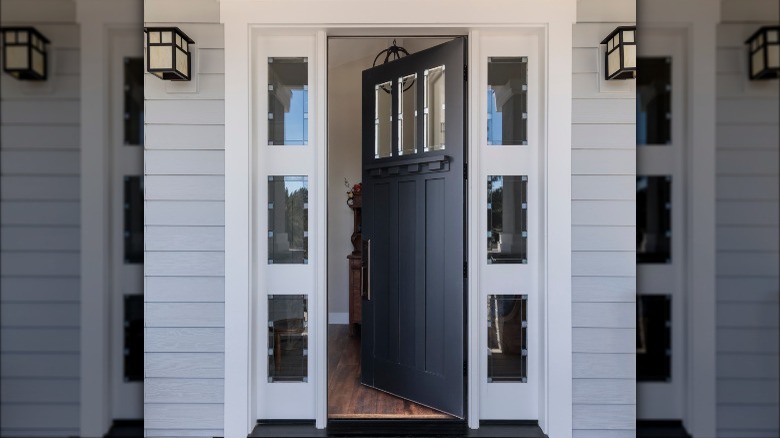 panels surrounding black door