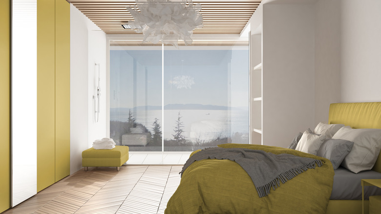 Yellow and gray bedroom with view