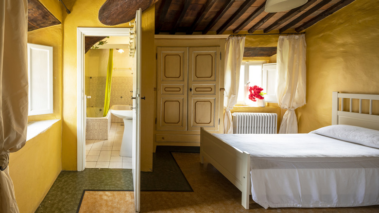 Yellow bedroom in old house