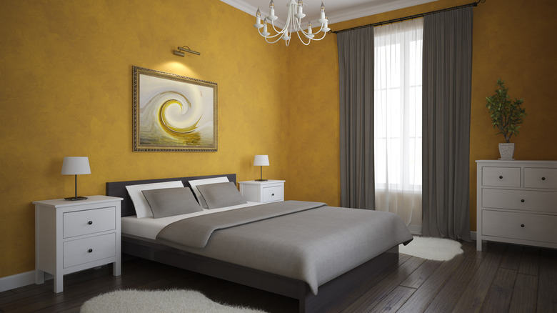 Dark yellow walls bedroom