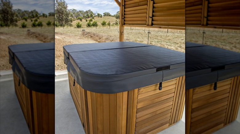 covered hot tub under pergola