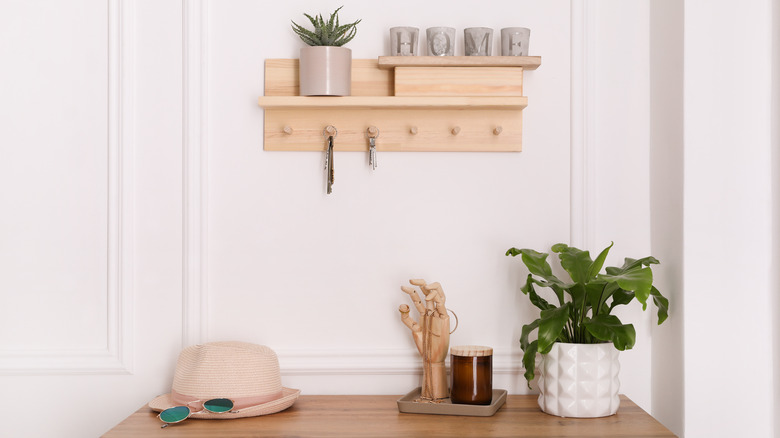 keys hanging on wooden holder