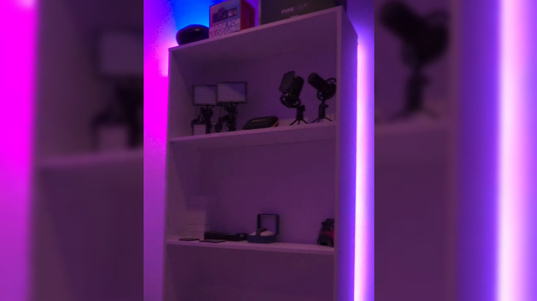 book shelf with LED light behind it