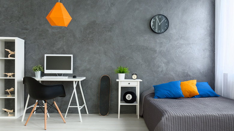 Gray bedroom with orange