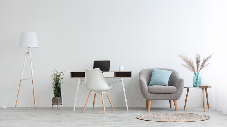 Gray side chair near desk