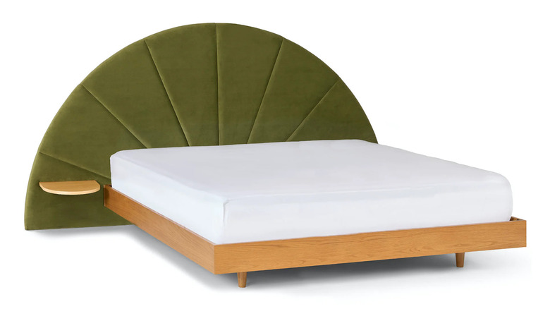 Green headboard with nightstands