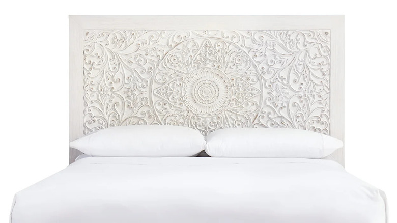 White carved headboard