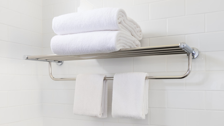 metal shelf with towel hanger