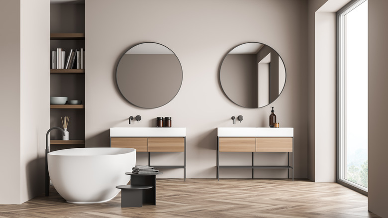 two bathroom vanities with shelves