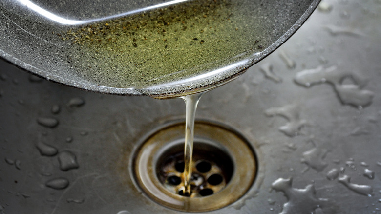 Kitchen grease pouring down sink drain