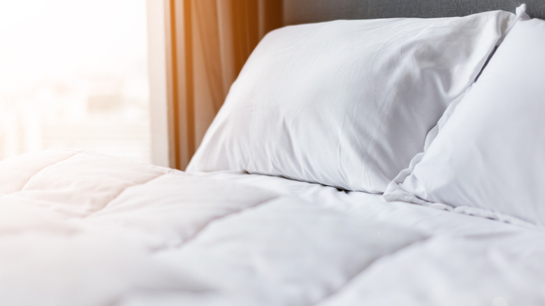 crisp white bedding and pillows