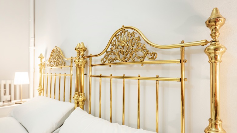 bright gold metal headboard