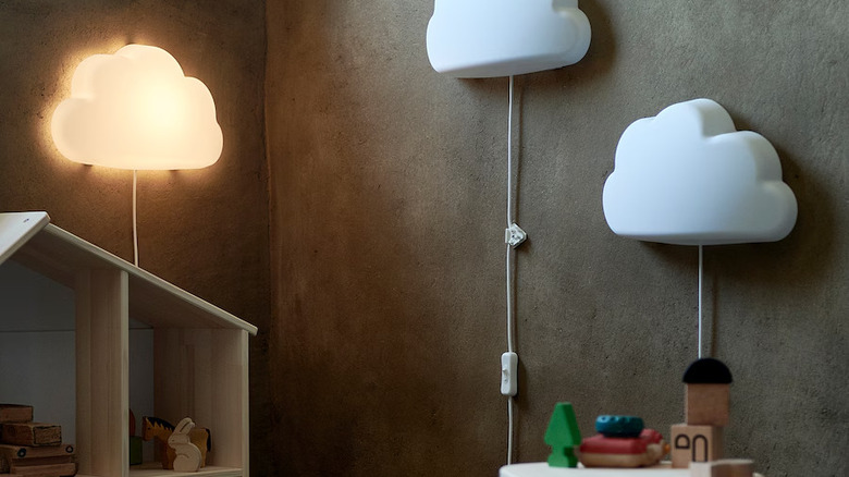 Cloud-shaped wall lights in playroom