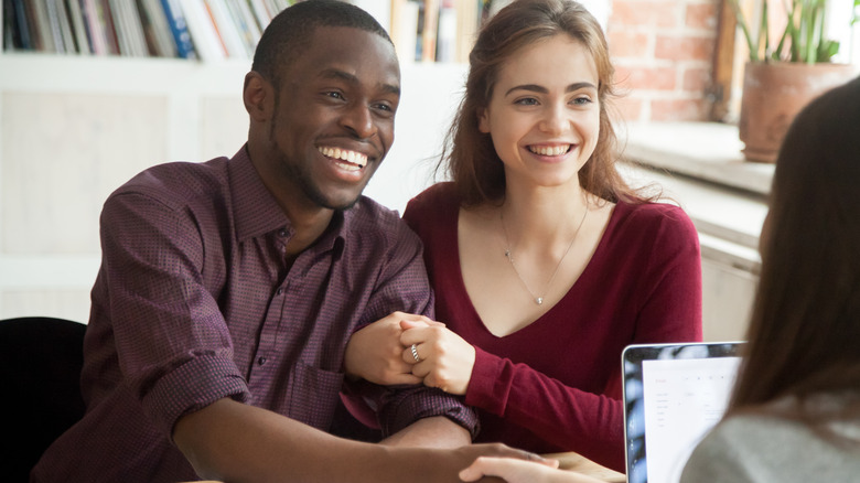 Couple meeting with a lender