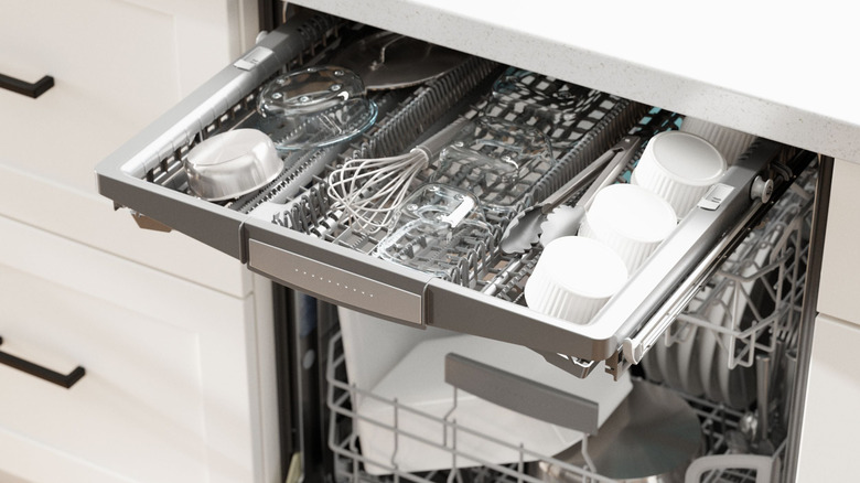 The Bosch 800 series dishwasher opened up with the third rack pulled out