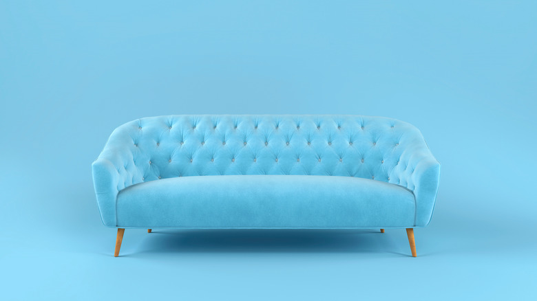 Blue couch blue background