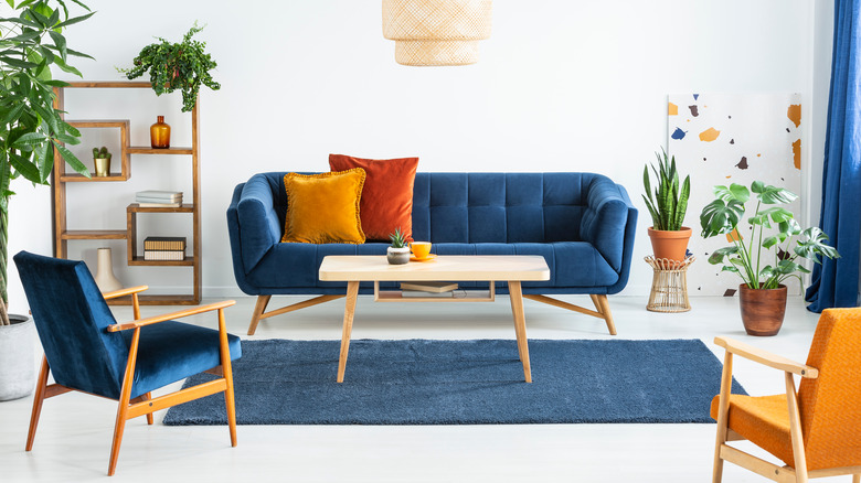 Blue couch and blue rug