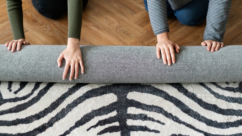 rolling an animal print rug