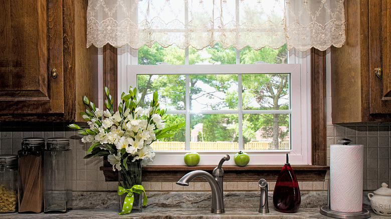 short sheer curtain above sink