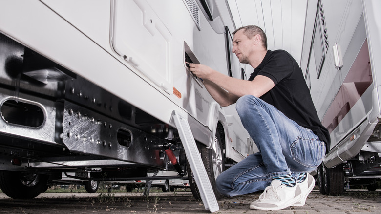 Man working on RV