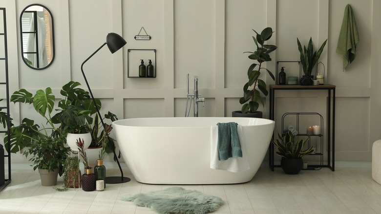 Tub surrounded by plants