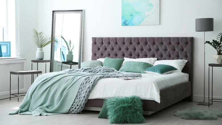 modern bedroom with mint decor