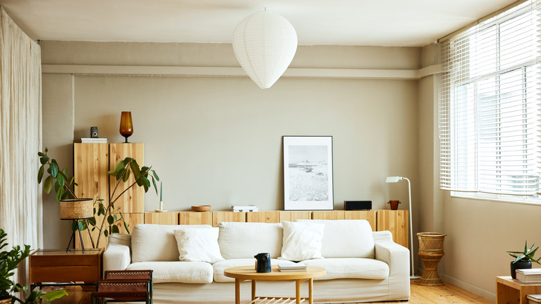 This living room has three different types of lighting.