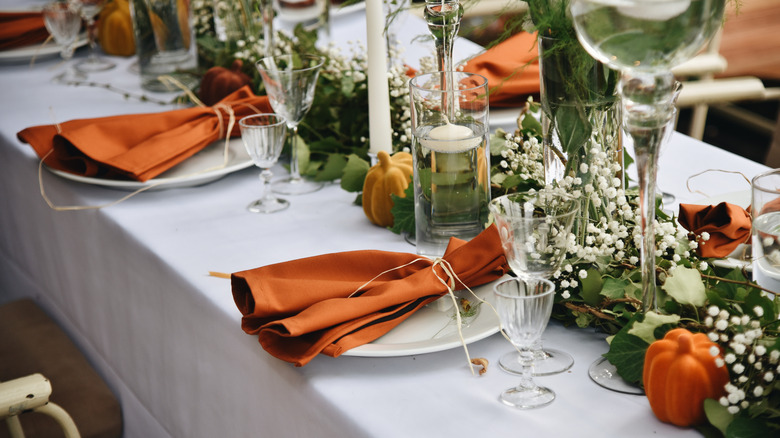 table setting with greenery