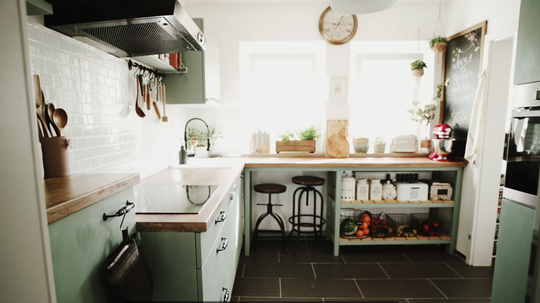 cozy sage green kitchen