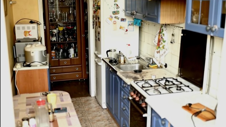 cluttered outdated kitchen 